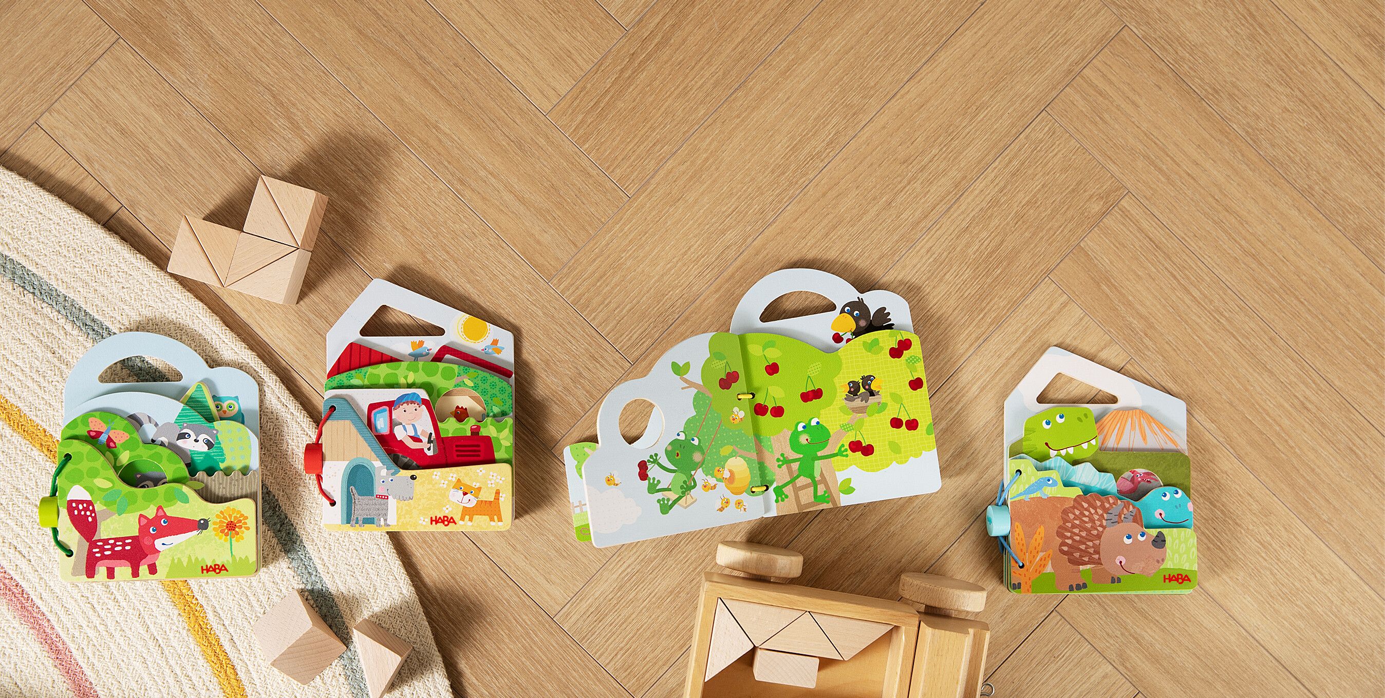 Holz-Babybuch Dinos